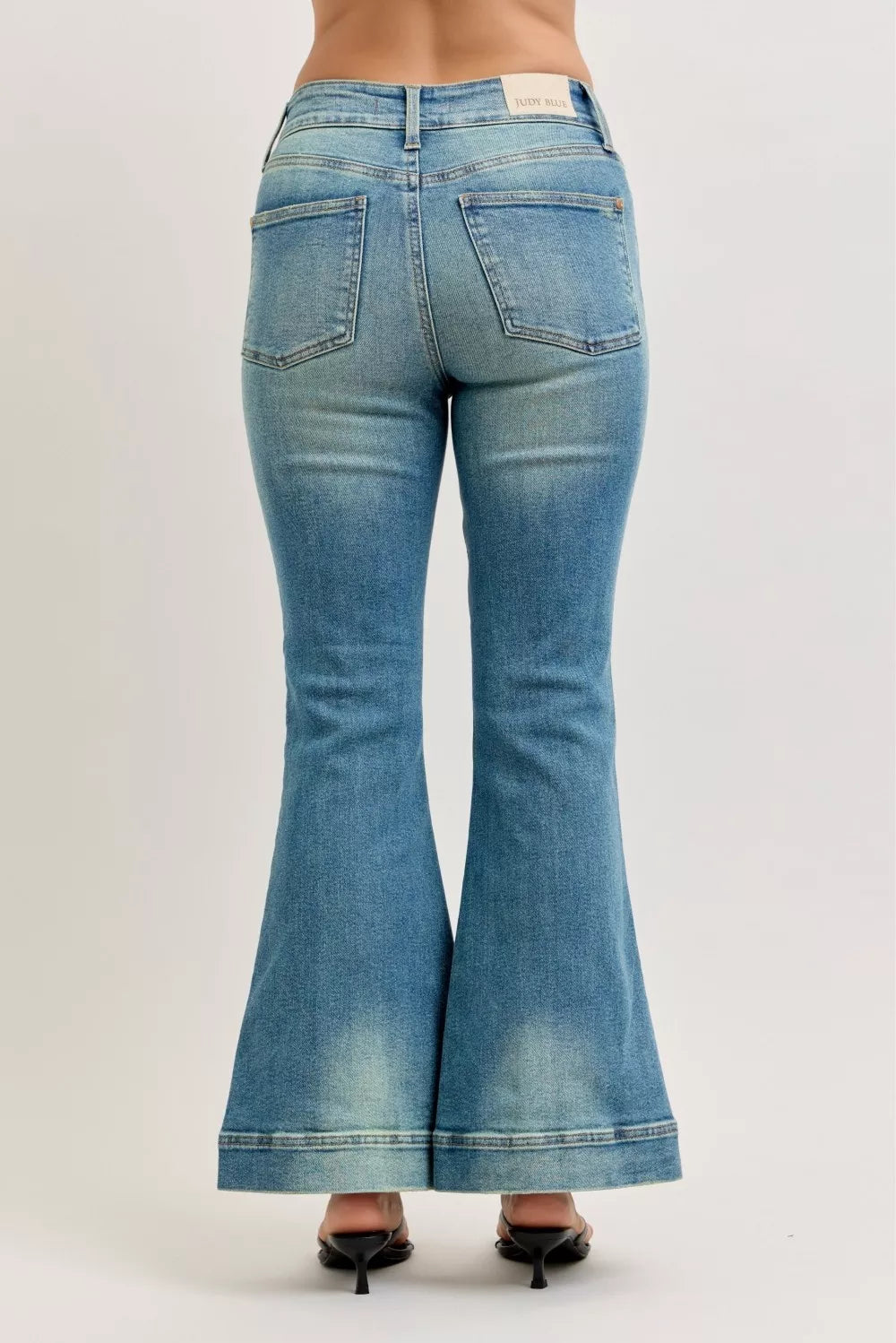 High-waist flare jeans with back pockets and vintage-wash finish, light blue denim