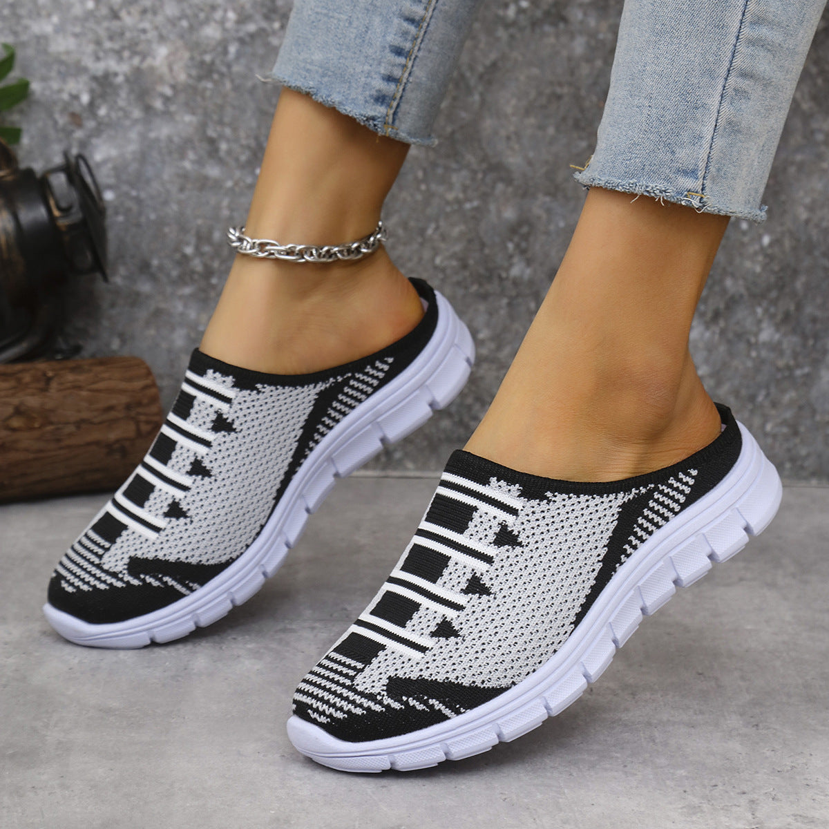 Black & white breathable knit slip-on sneakers, low-cut design with thick sole
