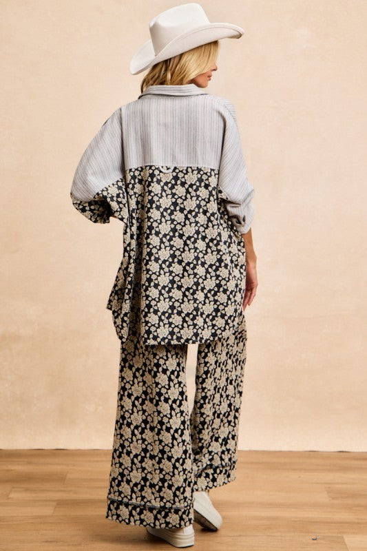 Back view: grey striped shirt top with black floral yoke and panels