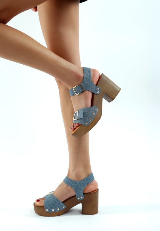 Denim studded sandals with dual buckles and chunky platform heel, open toe