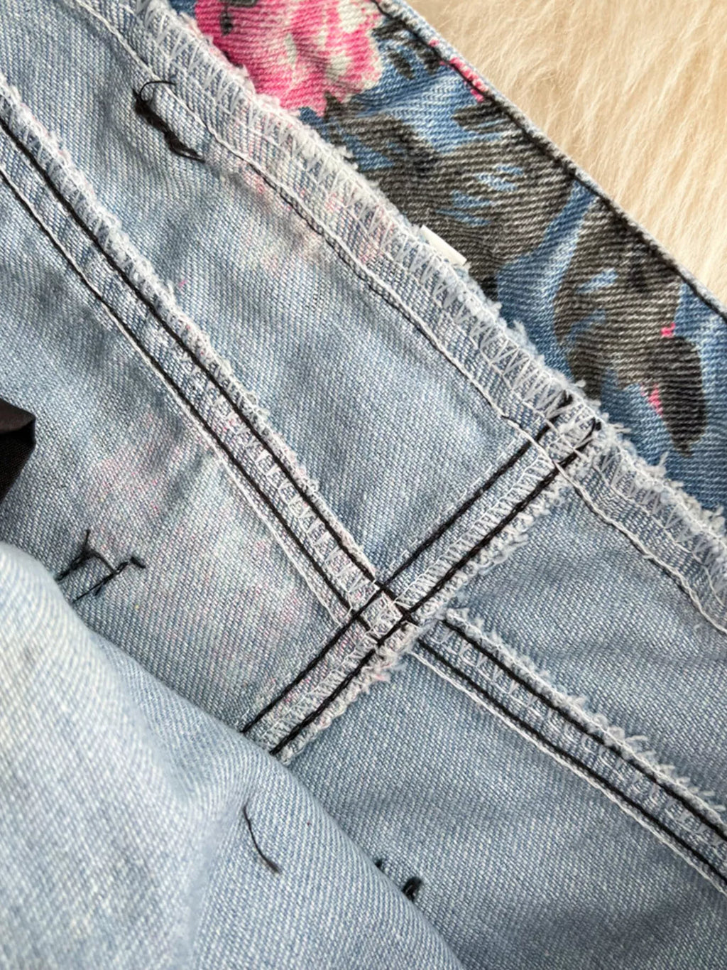 Blue denim skirt waist stitching with lace-up grommets and floral trim