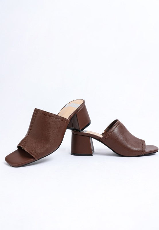 Brown slip-on leather heeled sandals with open squared toe and block heel