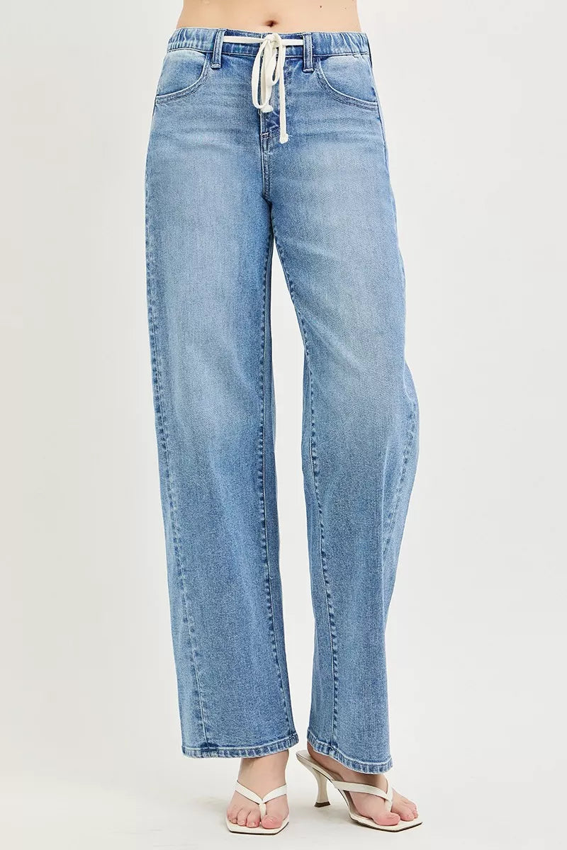 Light wash relaxed-fit jeans with drawstring waist and wide straight legs
