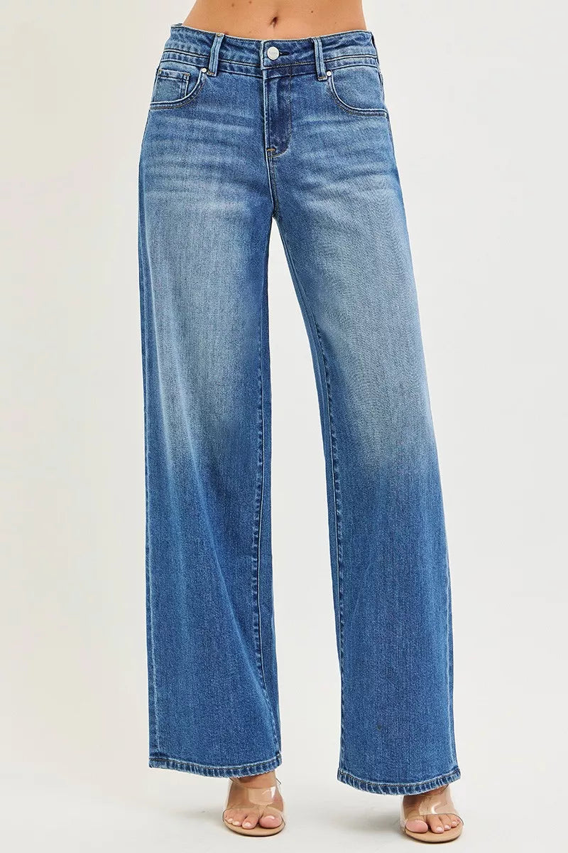 Medium wash blue slouchy baggy jeans, relaxed fit, front pockets and wide hems