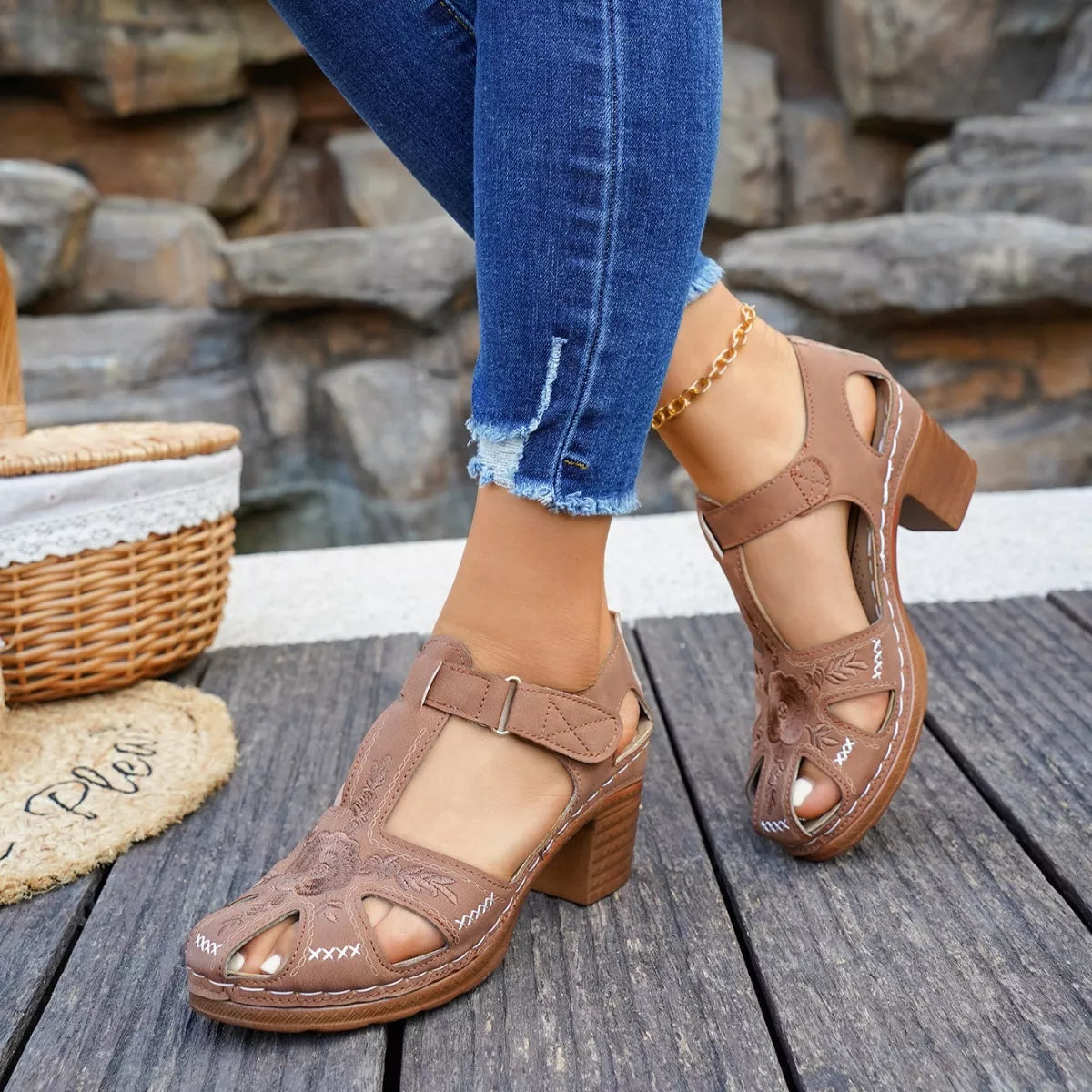Tan cutout block heel sandals with buckle ankle strap and floral embroidery