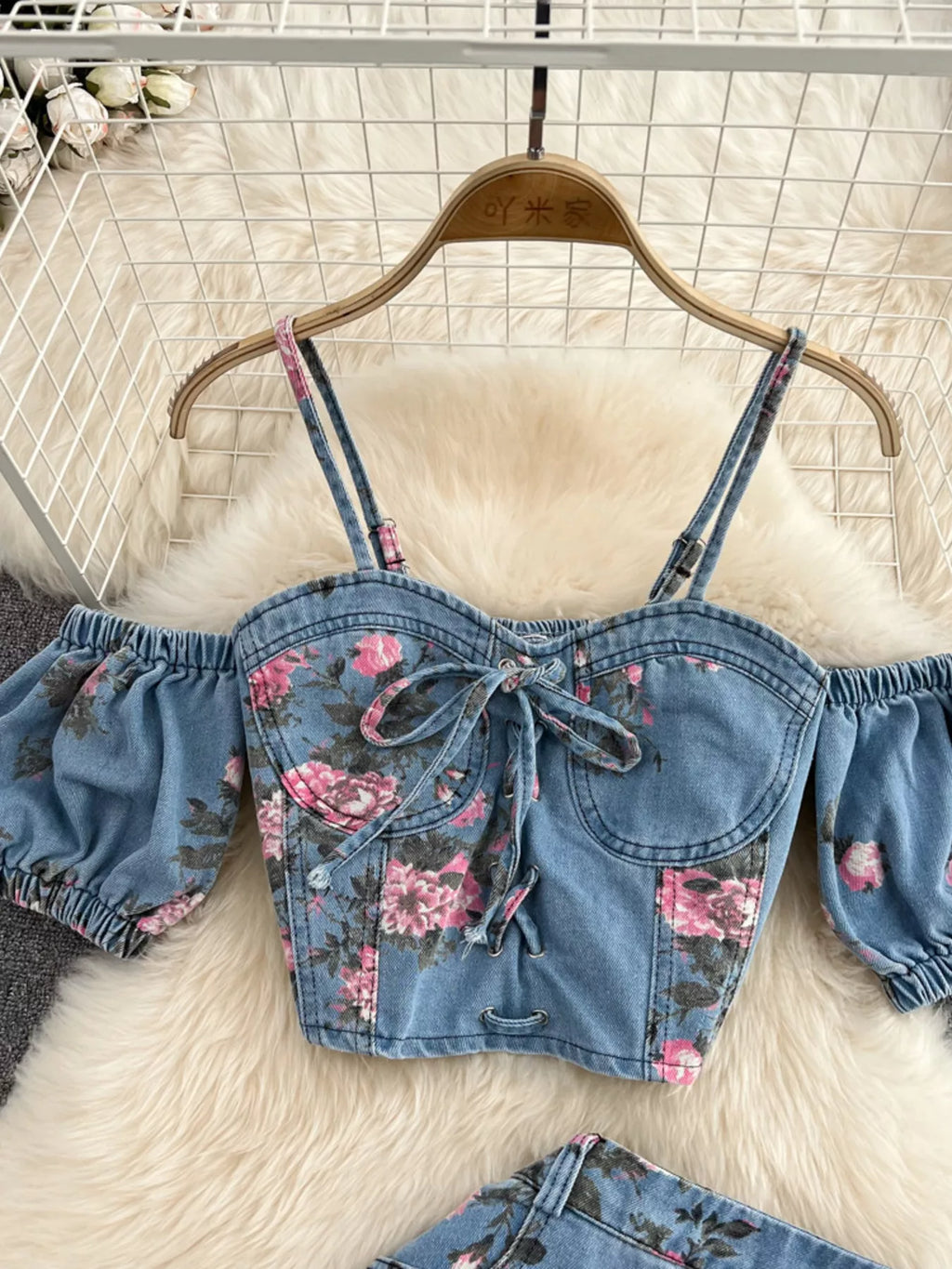 Sweetheart cami top in blue denim with floral print, lace-up bow detail