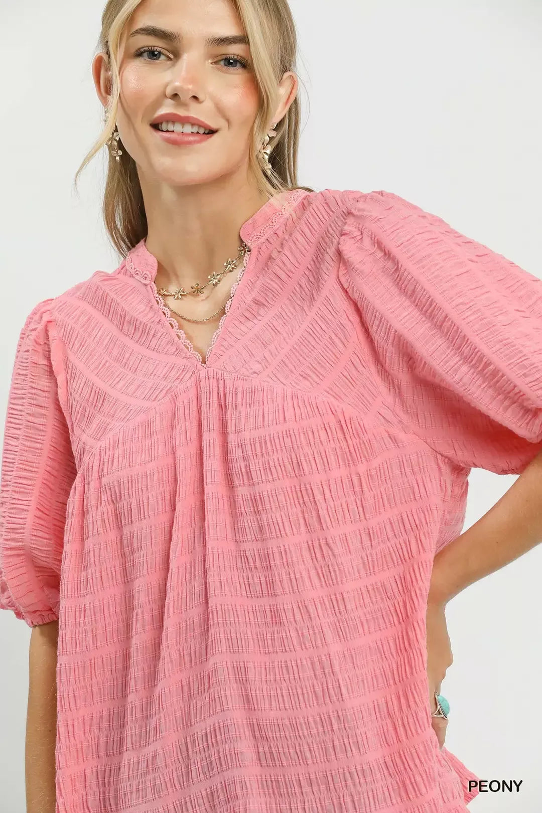 Peony V-neck textured blouse with puff sleeves and front smocked placket