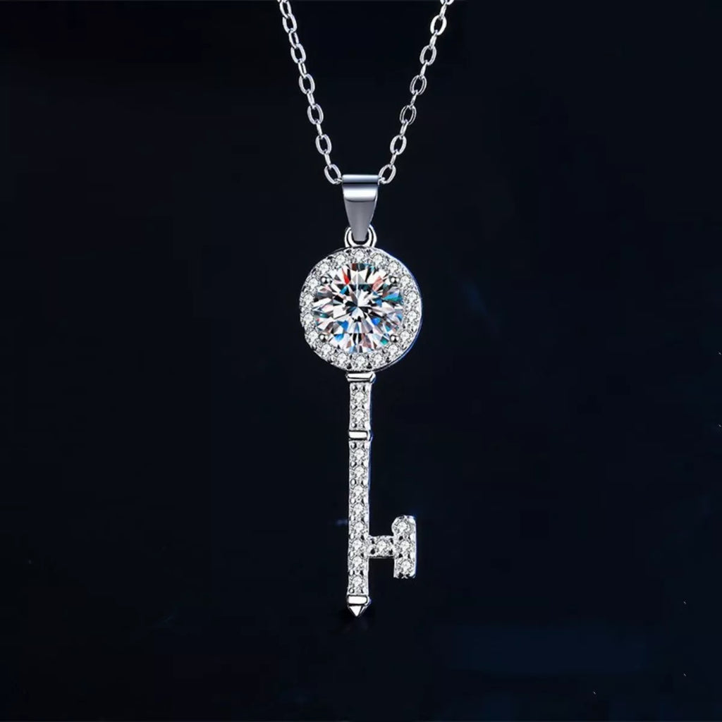 Sterling silver round moissanite key pendant necklace with sparkling key-shaped drop