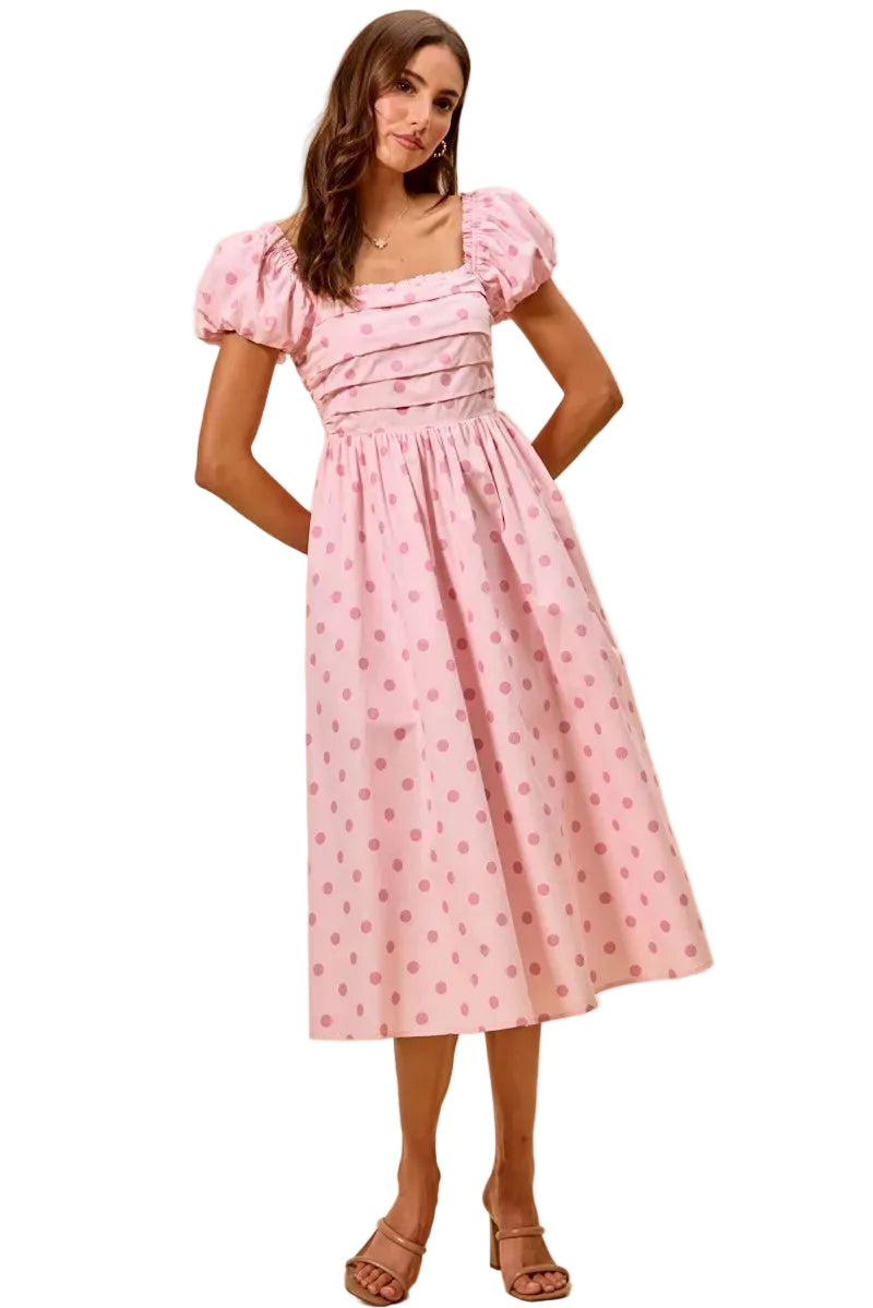 Pink polka-dot midi dress with gathered puff sleeves and fitted waist bodice