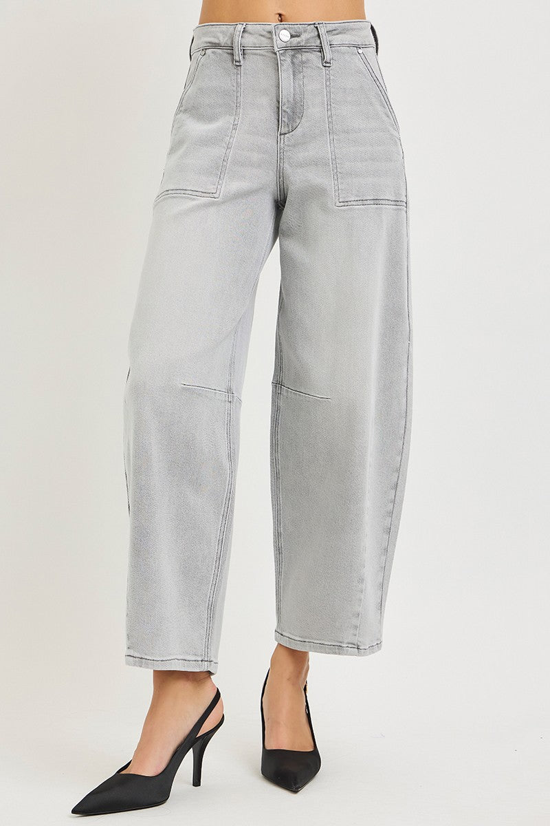 Light grey cropped barrel jeans side view, relaxed wide leg, belt loops and button closure