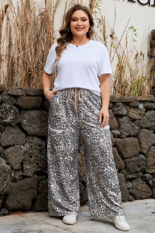 Leopard print drawstring pants with patch pockets, khaki tone, relaxed wide-leg fit