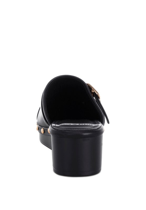 Black studded clog back view with closed heel and chunky platform block