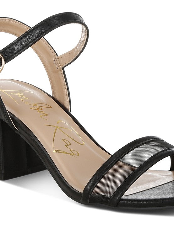 Black strappy block heel sandal with mesh panels and pin buckle detail