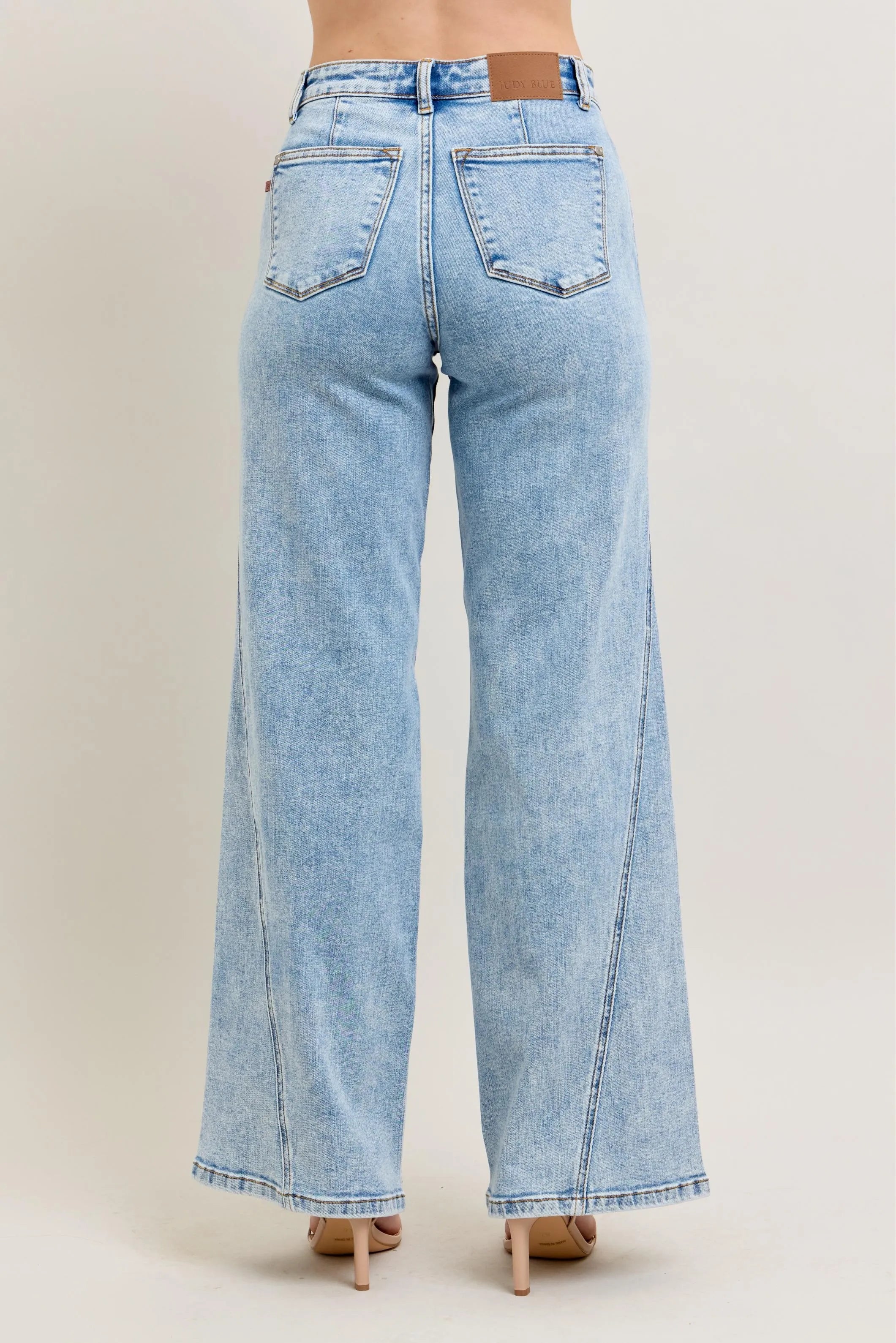 Light wash high-waist wide-leg jeans, back view with two back pockets