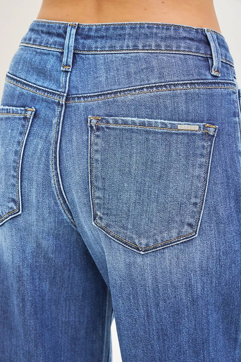 Medium wash blue denim with back patch pocket and contrast topstitching