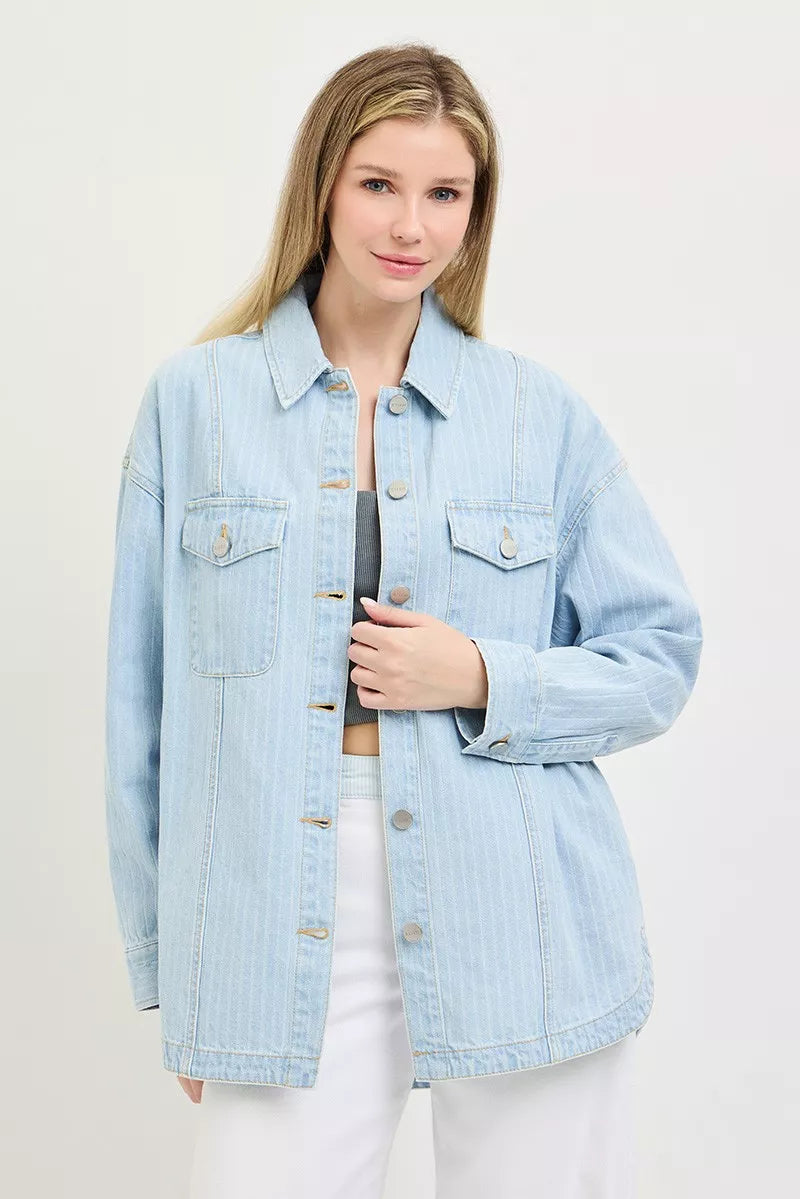 Light-wash oversized denim shaket with front buttons and chest flap pockets