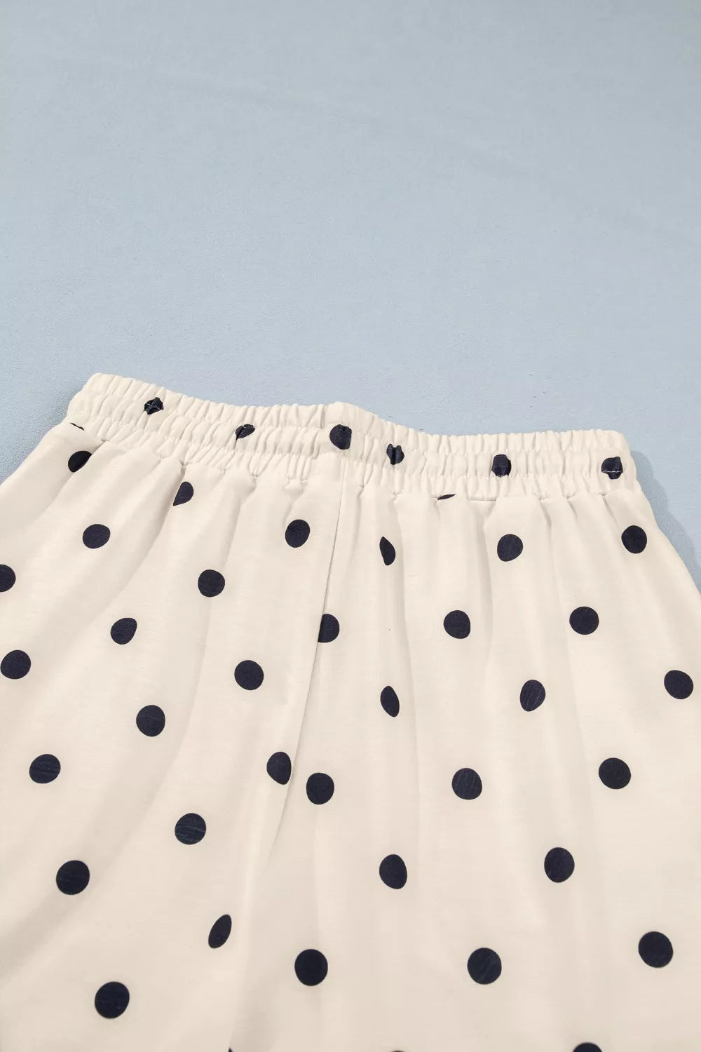 Cream polka dot shorts with gathered elastic waistband