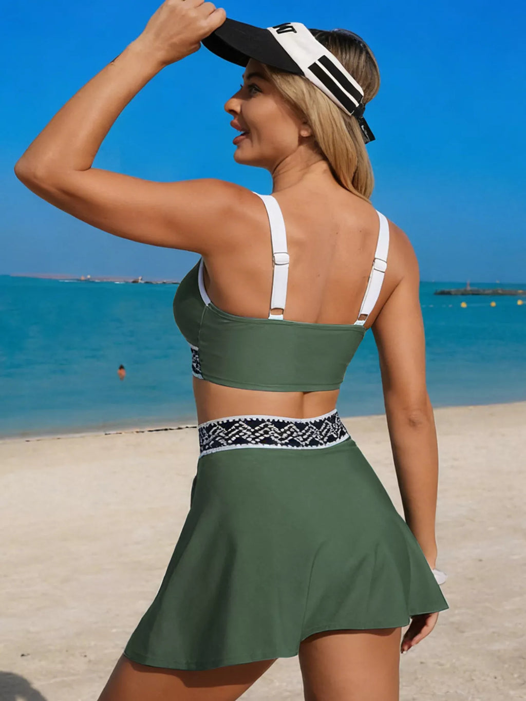 Army green swim set viewed from back: racerback tank with white patterned waist trim