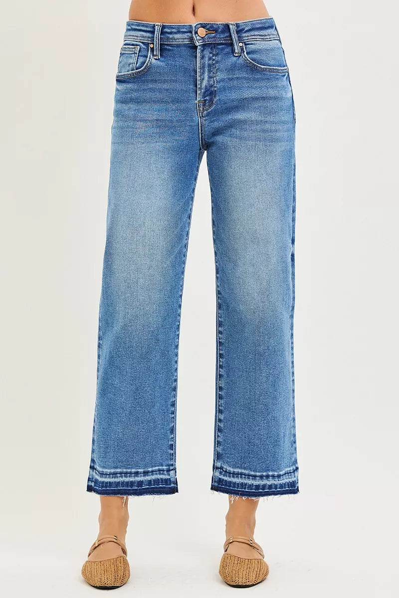 Medium-wash slouchy cropped boyfriend jeans, full-length front view; straight wide legs