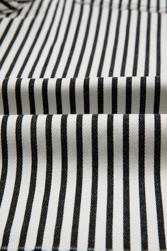 Black-and-white vertical stripe pattern on denim fabric