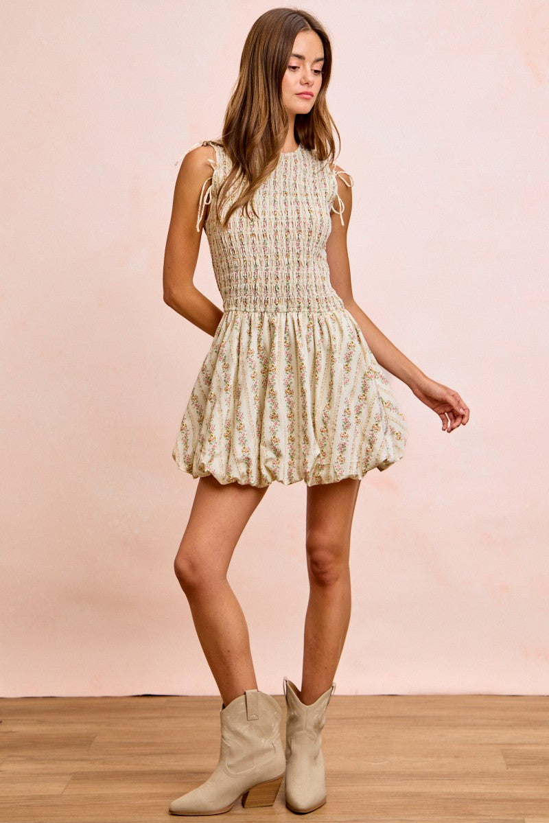 Ivory floral mini dress, sleeveless with puff shoulders and tie details