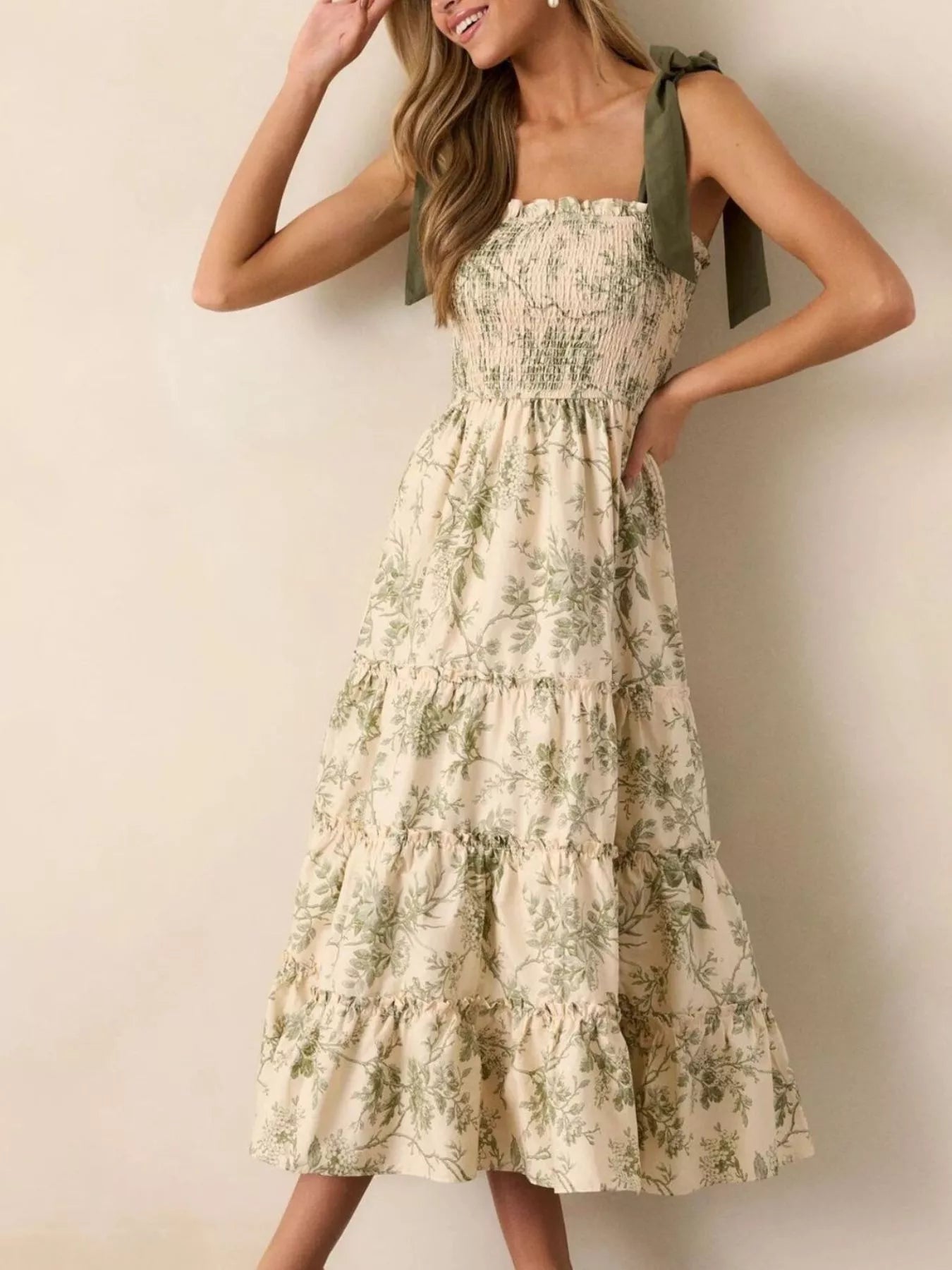 Floral print tiered midi dress with sage tie straps and layered ruffle skirt