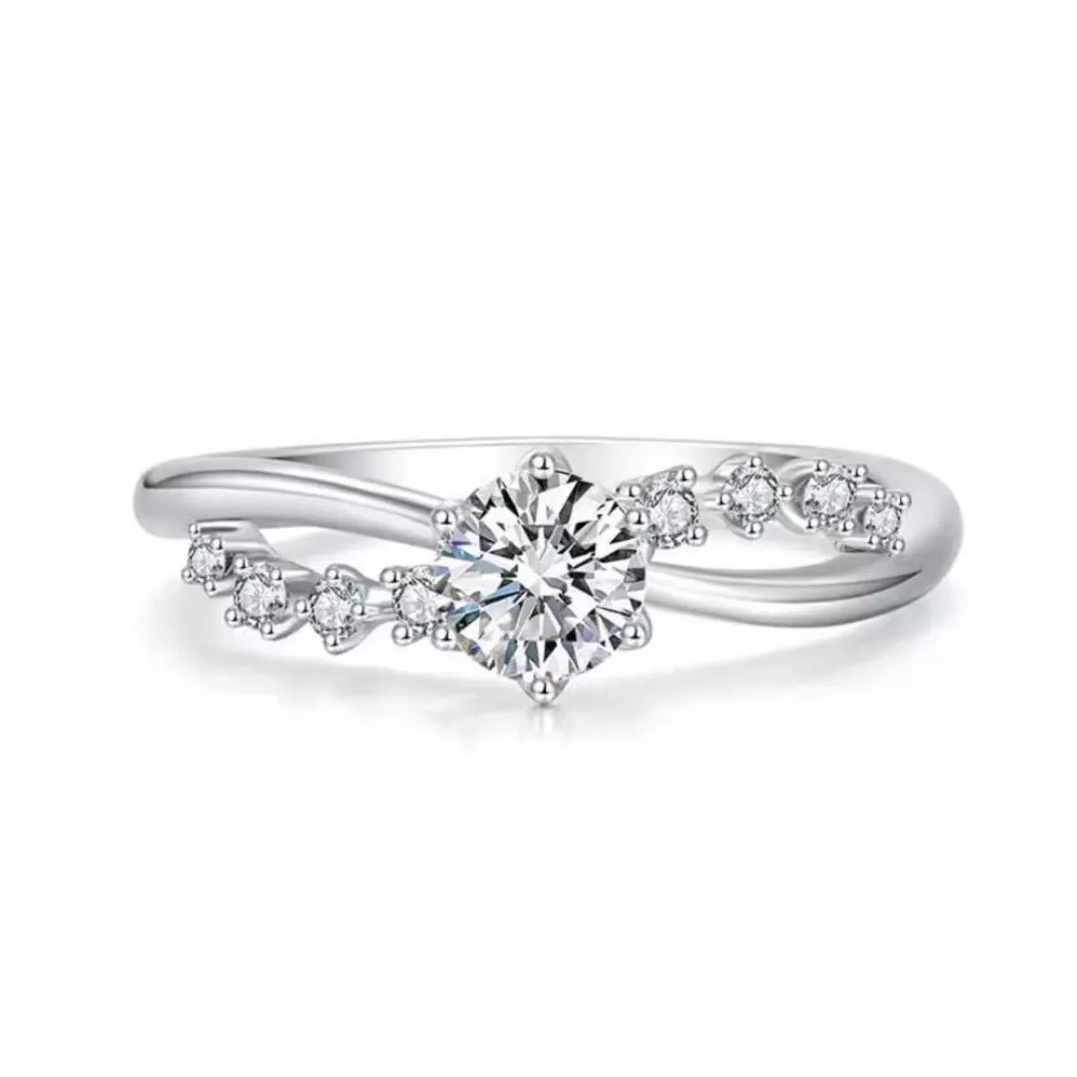 Silver zircon ring with double-band look, central round stone, and side halo details