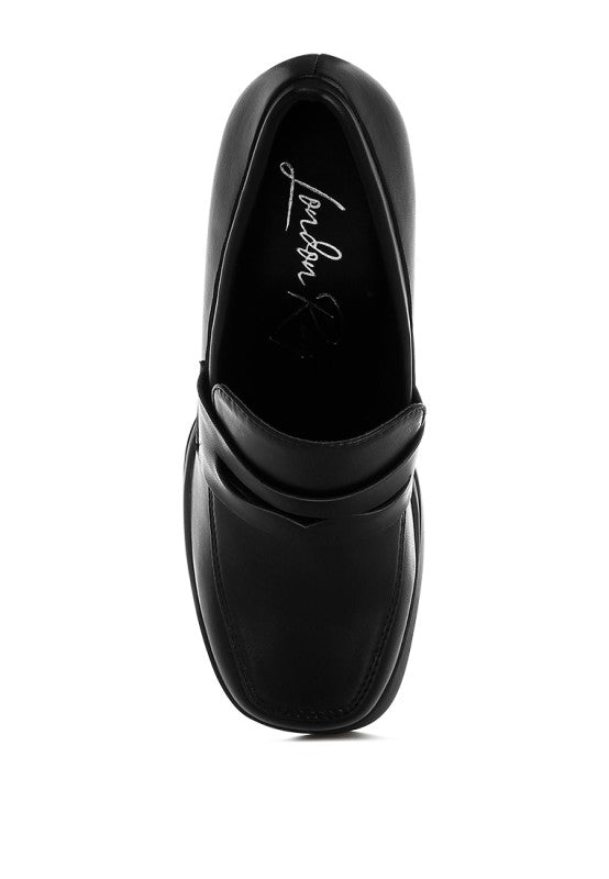 Black loafer side view with penny strap and sleek closed toe on chunky platform