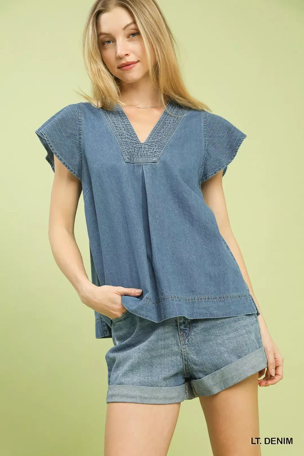 Umgee Cap Sleeve Denim Top in light denim, V-neck yoke and stitched hem