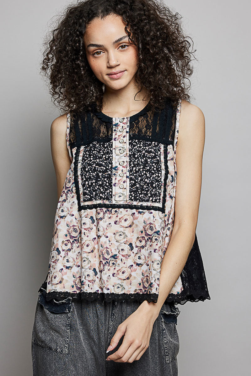 Black floral sleeveless top with lace side hem and button front