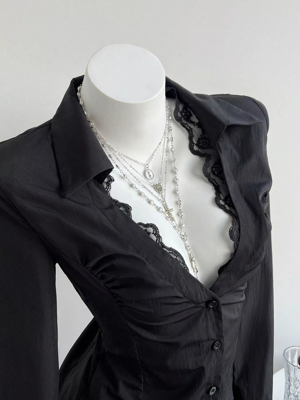 Black lace-trim slim-fit shirt, scalloped lace V-neck and button placket