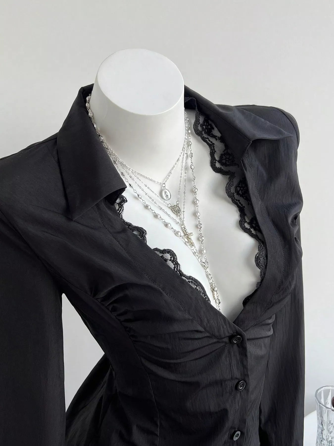 Black lace-trim slim-fit shirt, scalloped lace V-neck and button placket