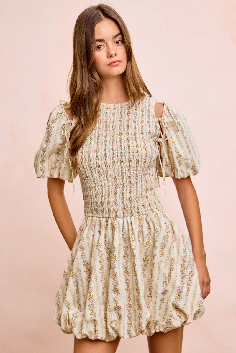 Ivory floral short-sleeve dress with bow-tied shoulder straps and tiered skirt