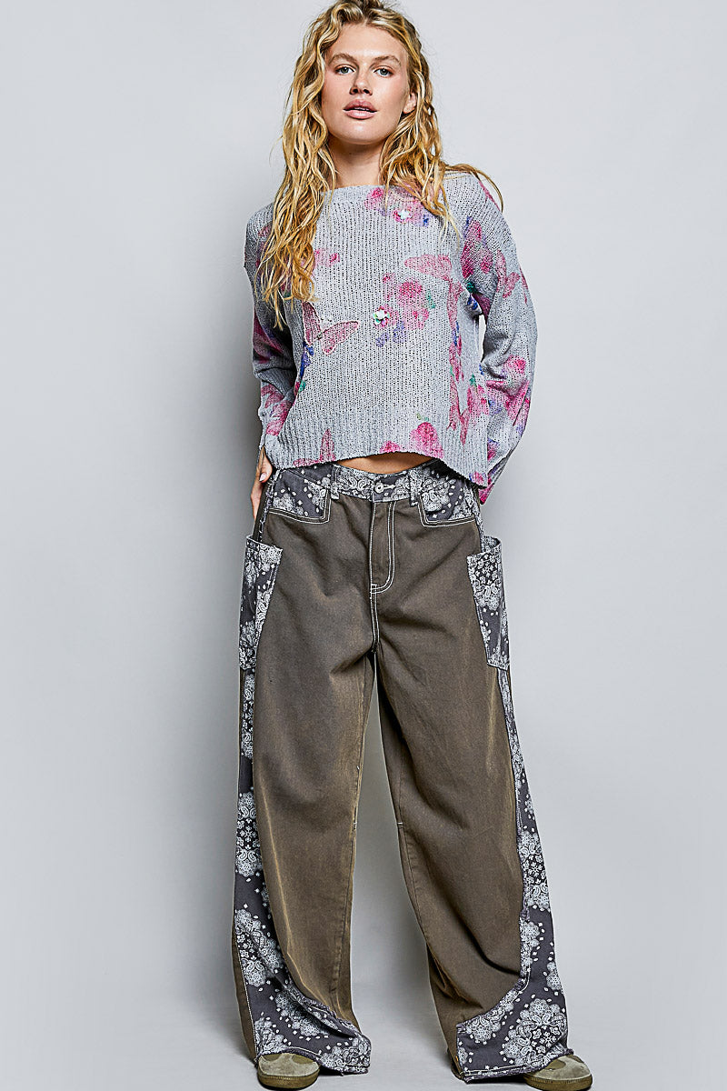 Heather grey butterfly-print knit top with round neck, 3/4 sleeves, cropped hem