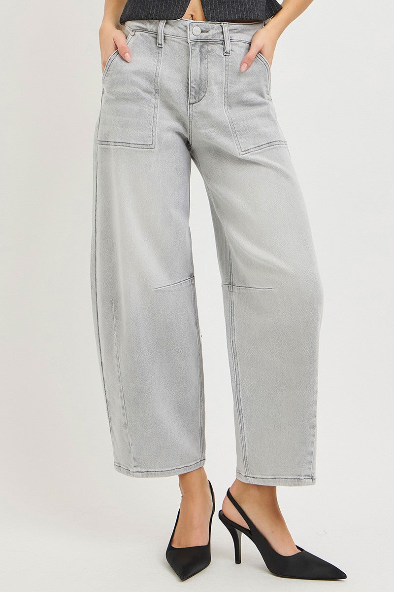 Light grey cropped barrel jeans close-up, high-rise waistband with belt loops and front pockets