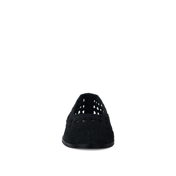 Black suede ballet flats, back view with perforated heel panel and flat sole