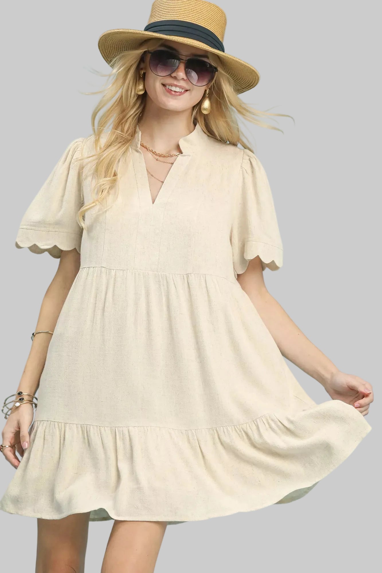 Oatmeal linen tiered babydoll dress with scalloped short sleeves