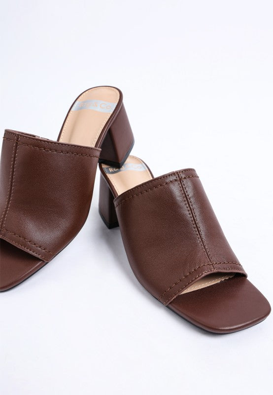 Brown leather open-toe mules with chunky block heel and wide strap