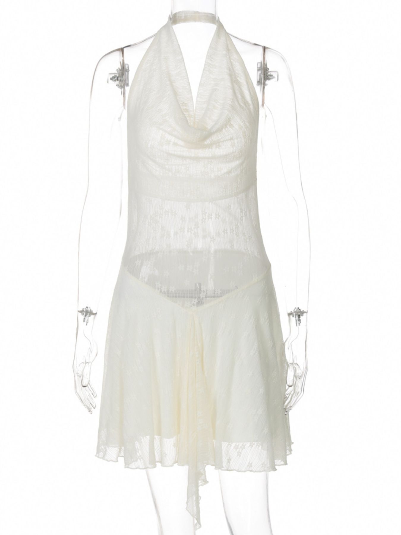 Cream halter neck mini dress on mannequin, asymmetric hem and pleated skirt