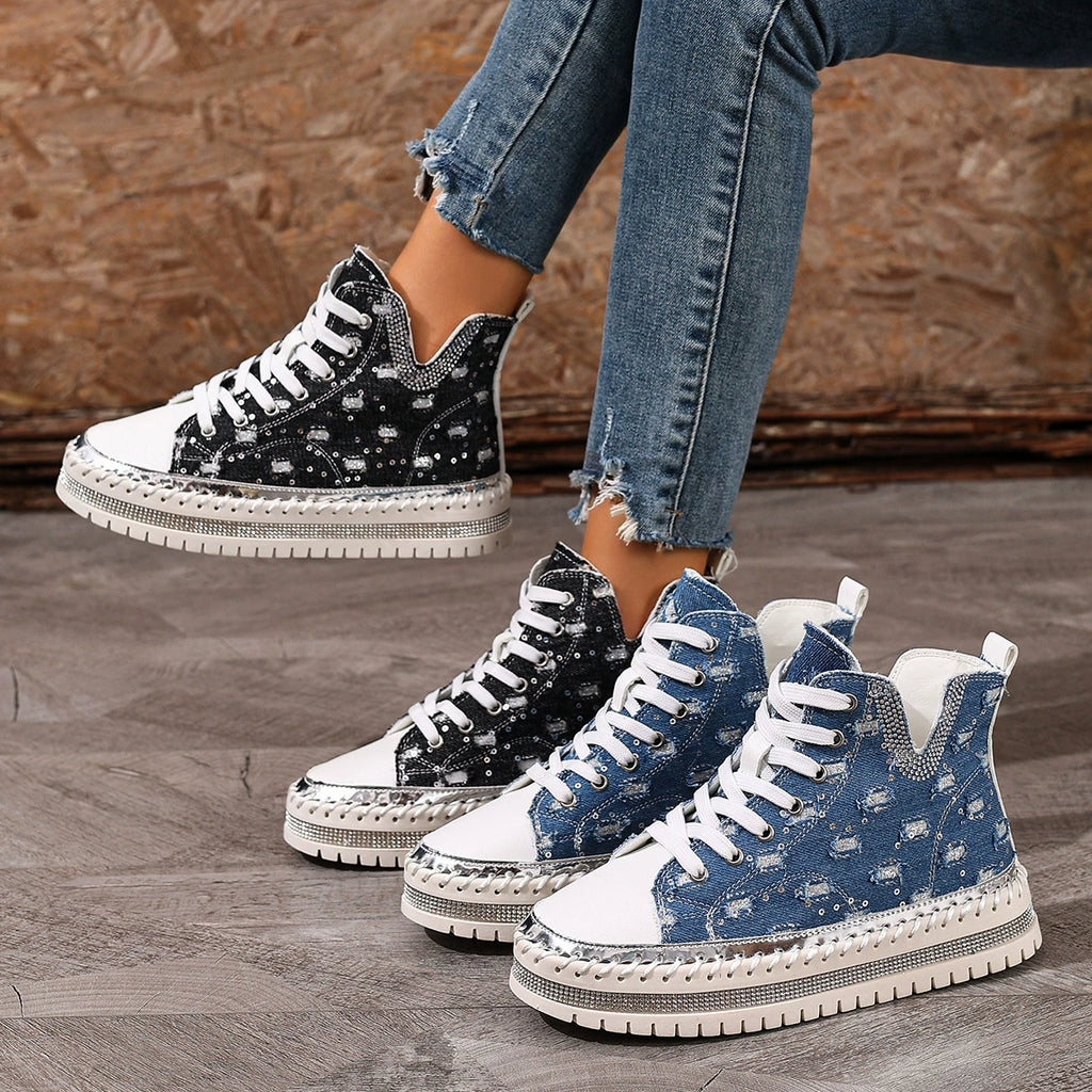 Black lace-up platform sneakers with white laces, speckled star-studded finish