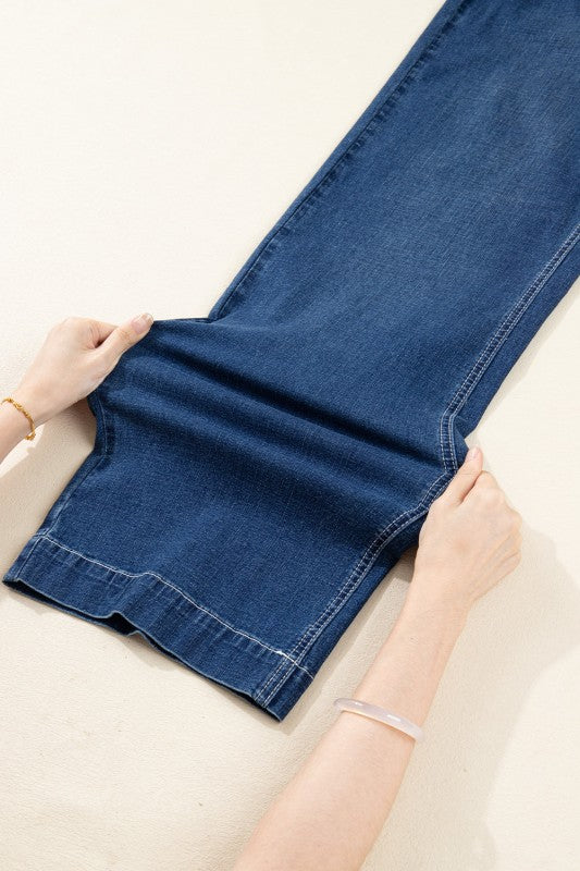 Sail Blue loose cuffed jeans folded at the hem