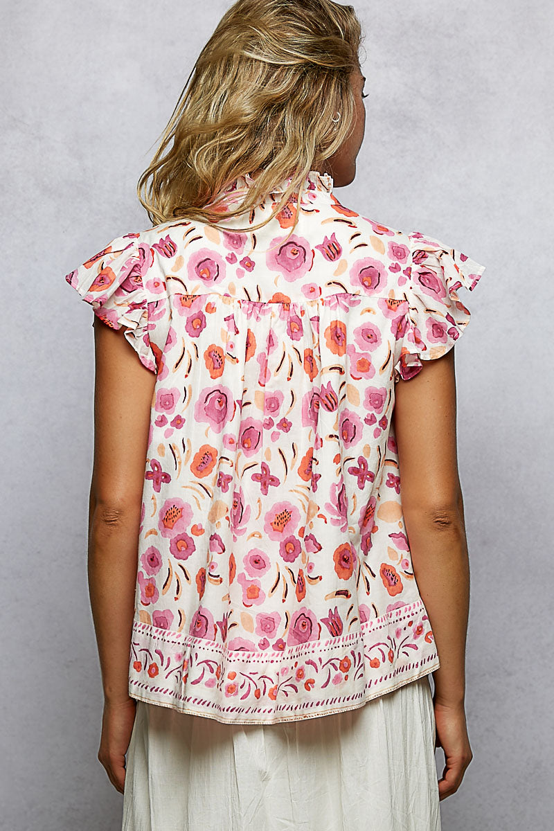 Pink floral flutter-sleeve blouse back, scalloped hem detail