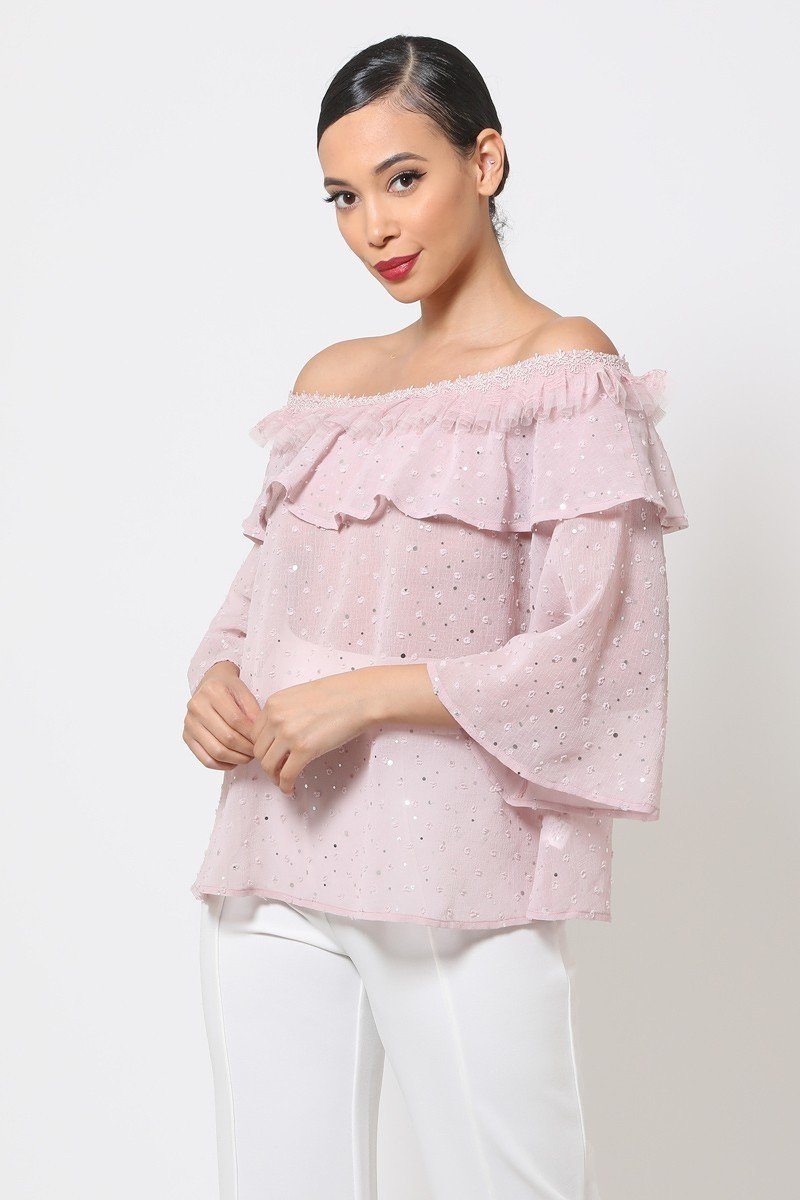Mauve sheer off-shoulder top with polka dot pattern and layered ruffle trim