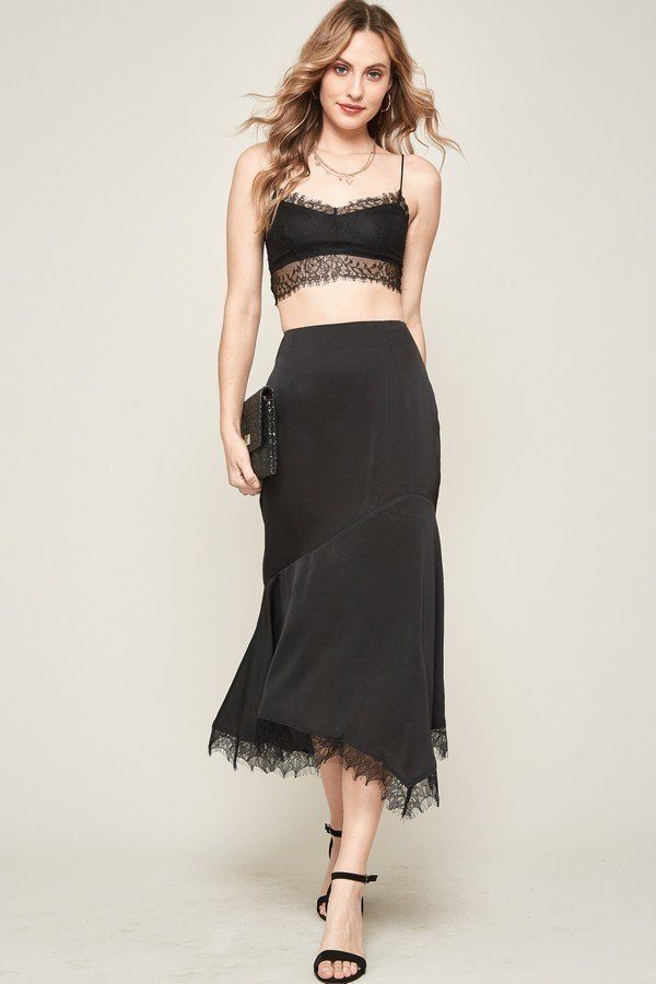 Solid woven midi skirt (black) with draped hem and lace trim