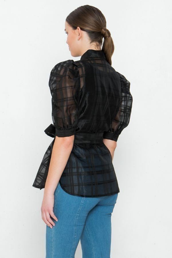 Back view: black sheer organza mini top with puff sleeves and tied waist