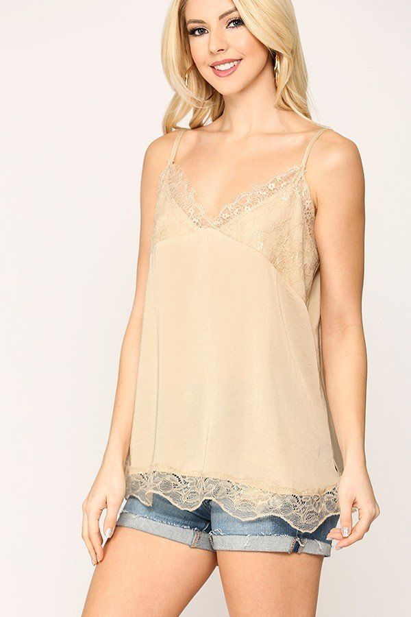 Champagne satin camisole with lace trim, spaghetti straps, and scalloped hem