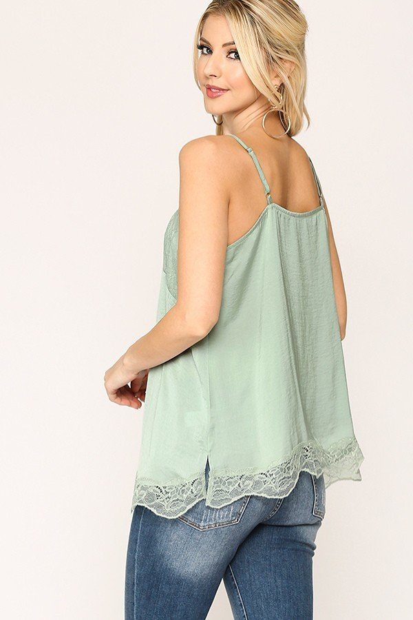 Sage satin camisole side view with lace hem and spaghetti straps