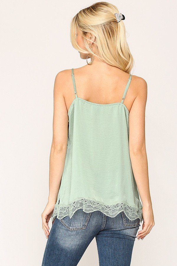 Sage satin cami top back view with thin straps and lace-trimmed bottom
