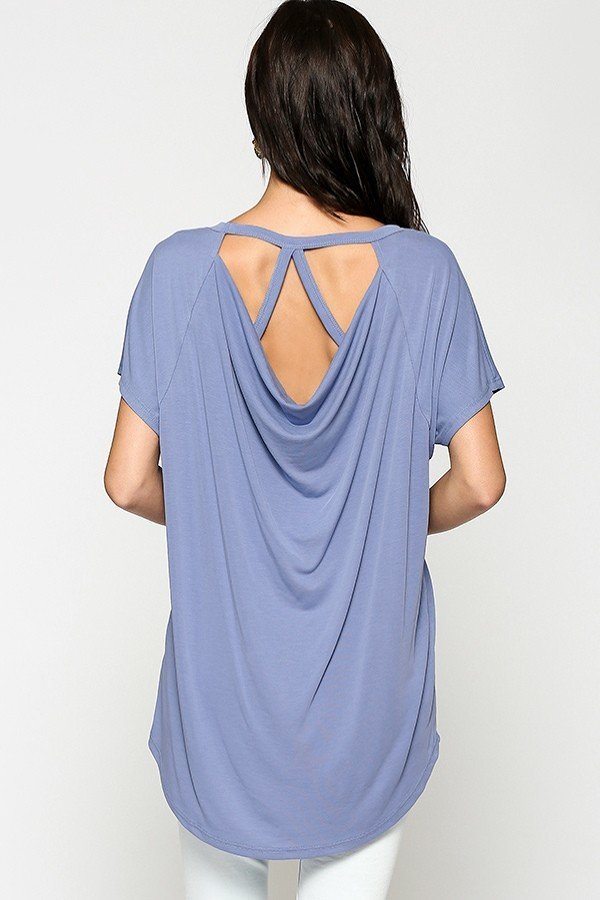 Back view: light blue cupro solid top with scooped back and crisscross straps