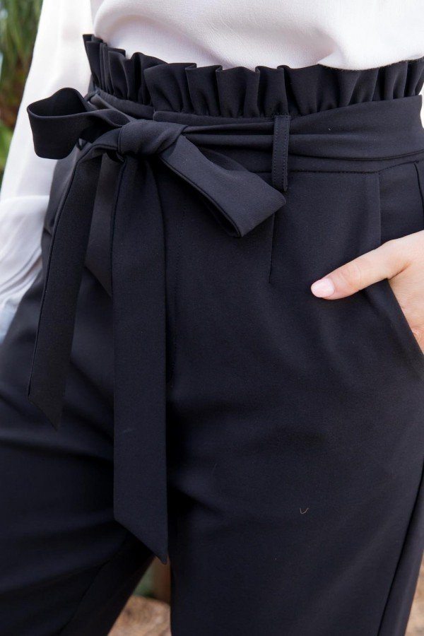 Black ruffle waistband with fabric tie belt and pleated detail.
